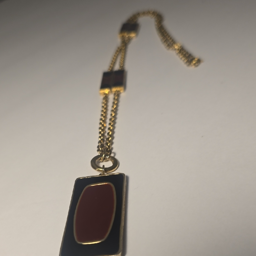 Elegant Gold and Black Necklace